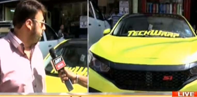 WATCH: Karachiites are now paper wrapping their cars!